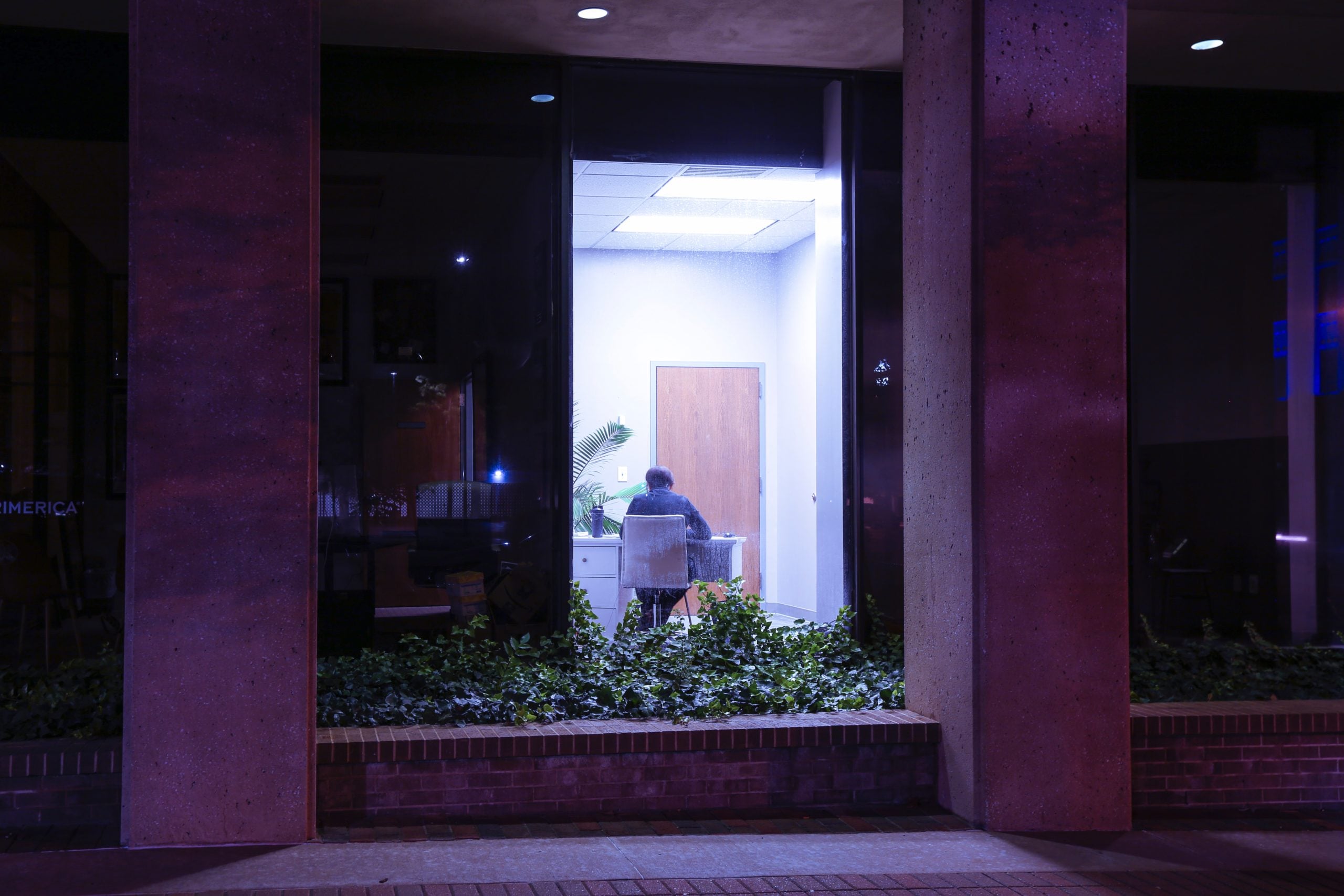 brown wooden door with glass panel